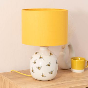 Show details for Bumble Bee Table Lamp with White Ceramic Base And Yellow Lampshade Creating  Warm Living Room Glow Picture of Bumble Bee Table Lamp with White Ceramic Base And Yellow Lampshade Creating  Warm Living Room Glow